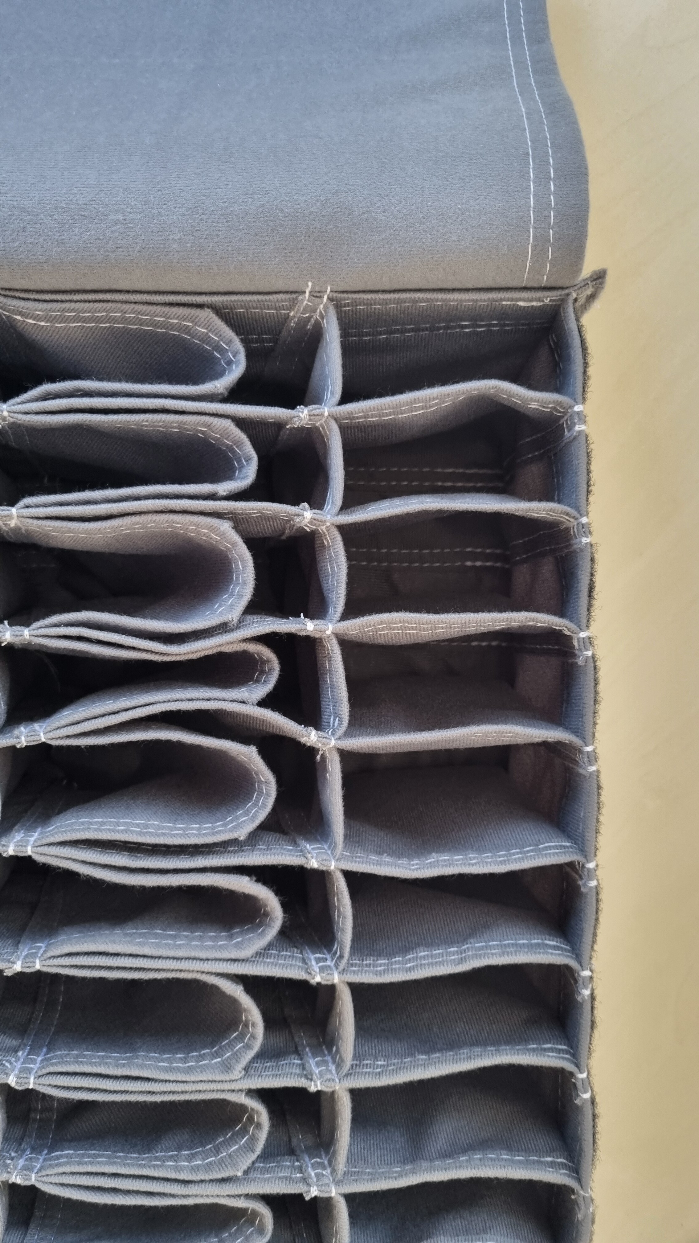 Detail of textile inserts in a logistics cart