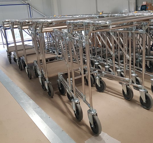 Stackable carts for transporting material.