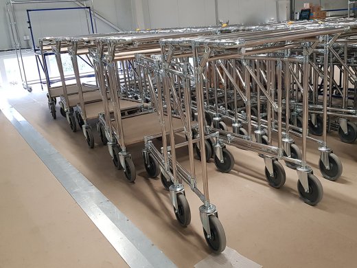 Stackable carts for transporting material.