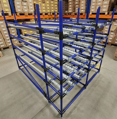 Gravity flow rack with roller tracks